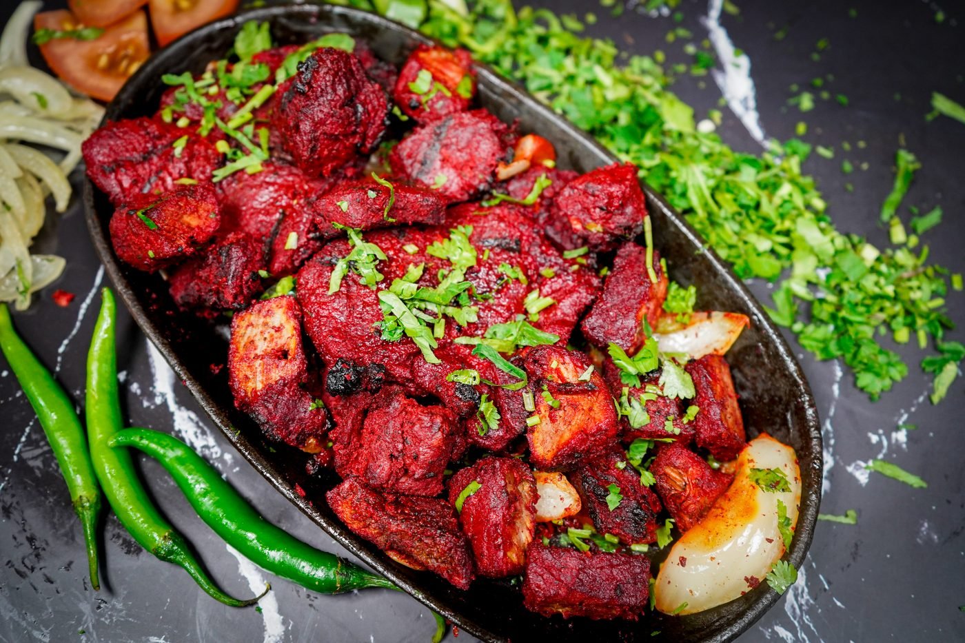 Lamb tikka on a sizzler